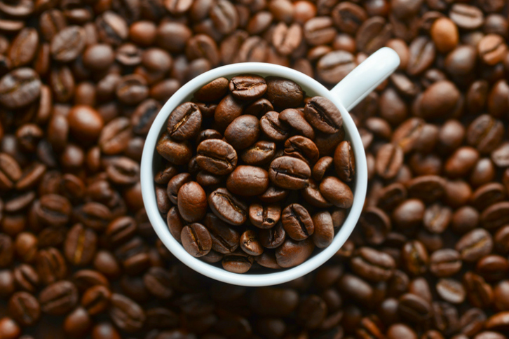 coffee grains in a white mug
